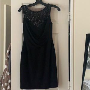 Glittery tight black dress